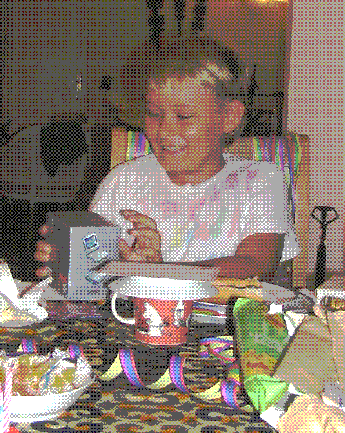 Me getting my Game Boy Advance on my 9th birthday.